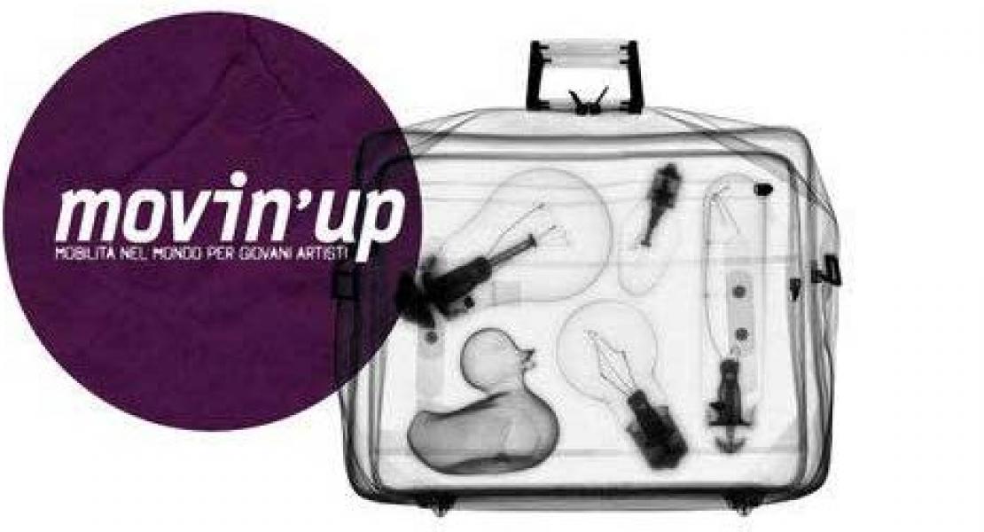 valigia con tondo e il nome movin'up